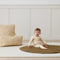 Toddler wearing an ergoPouch Long Sleeve Layer 1.0 TOG Vanilla