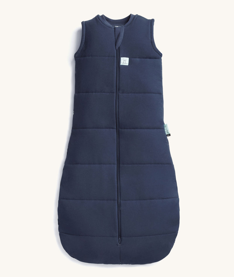 Product shot of the ergoPouch Sleeping Bag 2.5 TOG in blue ink colour, featuring a front zipper and a bell-shaped bottom.