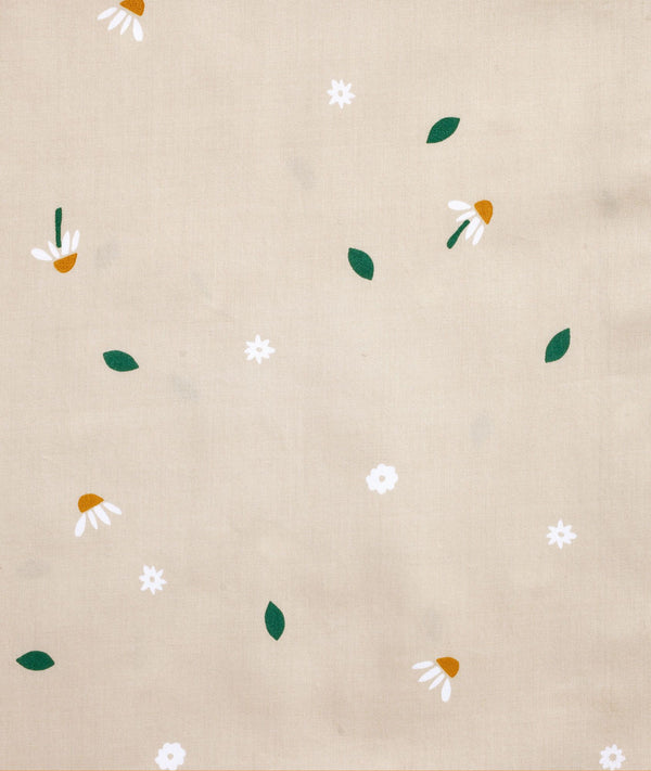 Close up of ergoPouch Daisy Sprinkle fabric print