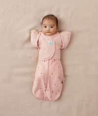 Newborn wearing ergoPouch Butterfly Cardi Daisies