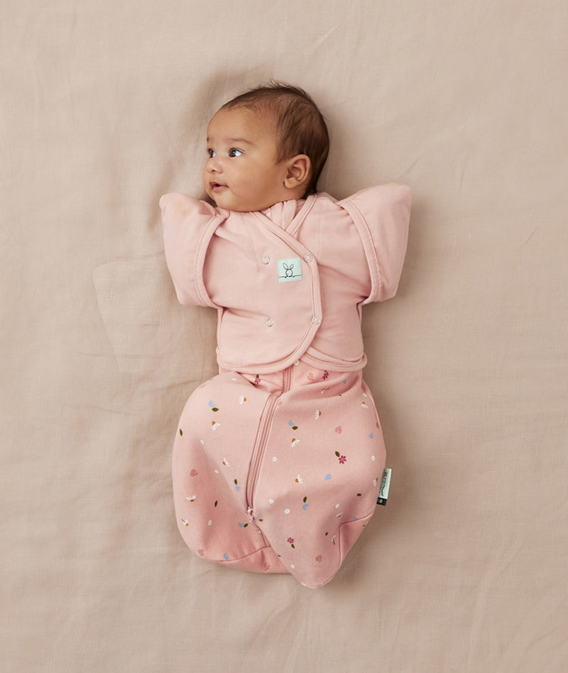 Organic cocoon swaddle with butterfly cardi from ergoPouch, perfect sleep solution for newborn babies.