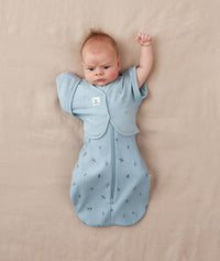 Baby wearing ergoPouch Butterfly Cardi Dragonflies with one arm out