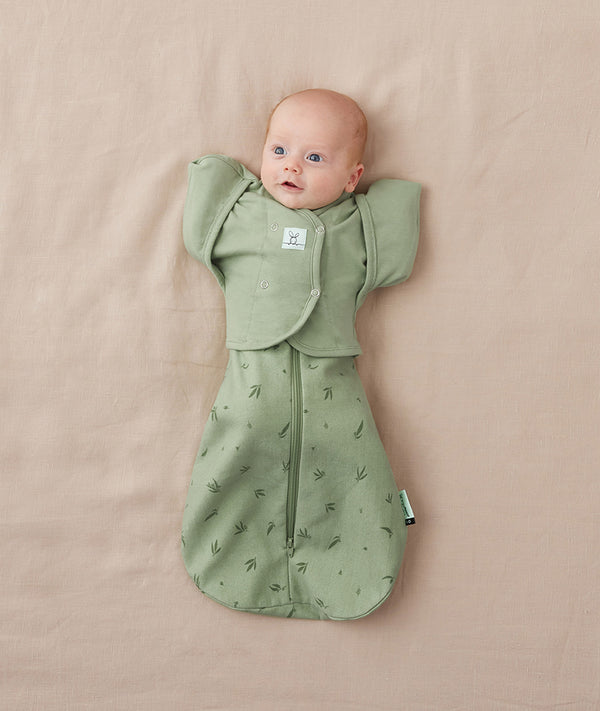 Newborn wearing ergoPouch Butterfly Cardi Willow Base and a matching Pouch in Willow