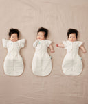 ergoPouch baby swaddle paired with organic butterfly cardi, perfect for newborn babies regardless of their sleep style.