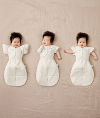 ergoPouch baby swaddle paired with organic butterfly cardi, perfect for newborn babies regardless of their sleep style.