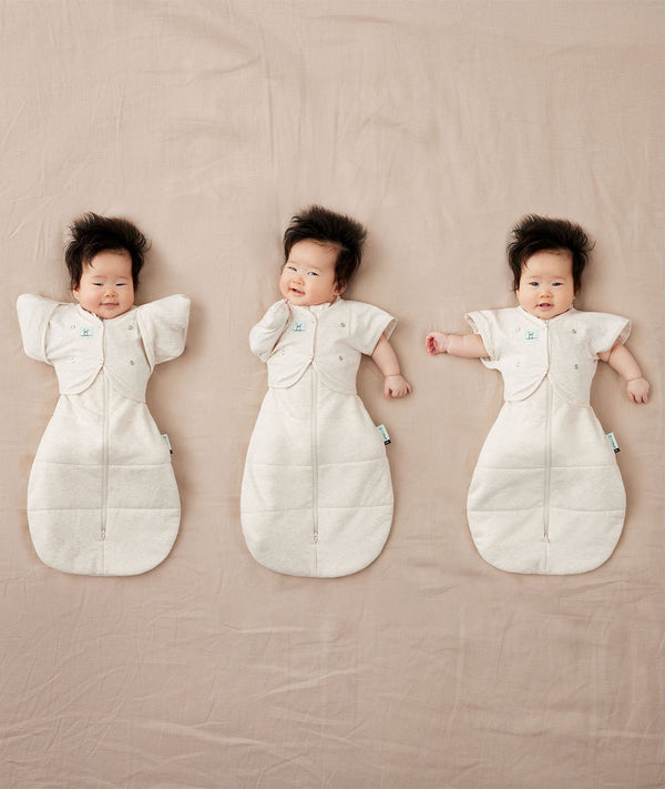 ergoPouch baby swaddle paired with organic butterfly cardi, perfect for newborn babies regardless of their sleep style.