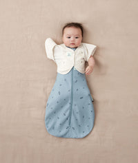 Baby wearing ergoPouch Butterfly Cardi Oatmeal Marle with one arm out