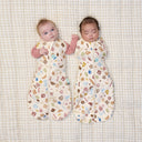Two babies wrapped in ergoPouch Cocoon Swaddle Bag 1.0 TOG in Bon Appetit