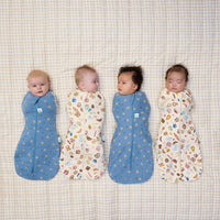 Four newborn babies asleep in ergoPouch Cocoon Swaddle Bag 0.2 TOG in Petit Pretzel and Bon Appetit