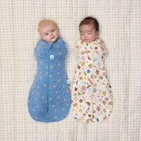 Babies being swaddled in ergoPouch Cocoon Swaddle Bag Bon Appetit and Petit Pretzel