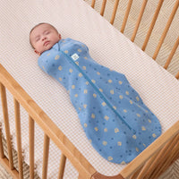 Baby asleep in ergoPouch Cocoon Swaddle Bag 0.2 TOG Petit Pretzel
