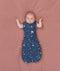 Baby transitioned to arms out sleeping easily with the ergoPouch Cocoon Swaddle Bag 1.0 TOG Starbeam