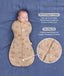 Product graphic featuring a sleeping baby in a tan Cocoon Swaddle Bag, highlighting Organic Cotton and a Two-Way Zip feature with a close-up inset.