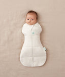 Newborn wearing an ergoPouch Cocoon Swaddle Bag 3.5 TOG Oatmeal Marle