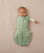 Newborn wearing an ergoPouch Cocoon Swaddle Bag 3.5 TOG Willow with one arm out