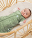 Newborn wearing an ergoPouch Cocoon Swaddle Bag 2.5 TOG Willow with arms out