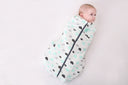 Baby wearing a Cocoon Swaddle Bag 2.5 TOG Clouds