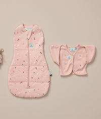 ergoPouch Butterfly Cardi Daisies next to a matching Pouch in Daisies