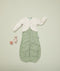 Baby wearing ergoPouch Arm Warmers Oatmeal Marle