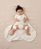 Baby with hip dysplasia wearing ergoPouch Hip Harness Jersey Sleep Bag 0.2 TOG Oatmeal Marle