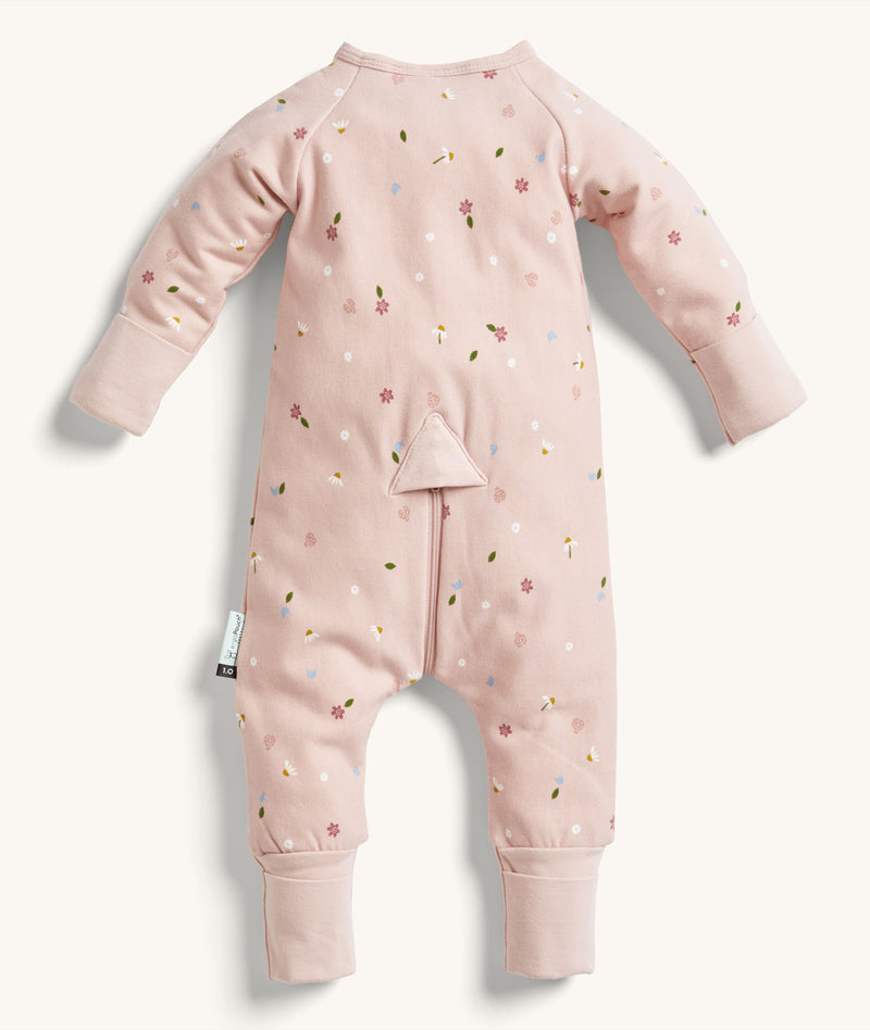 Back view of the ergoPouch Long Sleeve Layer Daisies, featuring hand and foot cuffs.