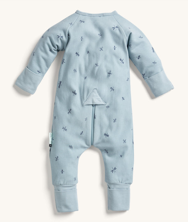 The back view of the ergoPouch Long Sleeve Layer is shown in blue with dragonfly prints.