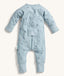 The back view of the ergoPouch Long Sleeve Layer is shown in blue with dragonfly prints.