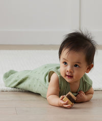 Organic baby sleeping bag from ergoPouch, made from soft, breathable materials gentle on skin.