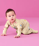 Baby wearing an ergoPouch Long Sleeve Layer 1.0 TOG Birthday Blobs