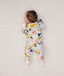 Newborn baby wearing an ergoPouch Long Sleeve Layer 1.0 TOG Fruit Salad