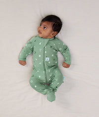 Newborn baby wearing an ergoPouch Long Sleeve Layer 1.0 TOG Sweet Orchard