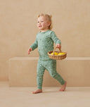 Toddler wearing 2-piece ergoPouch Long Sleeve Pyjamas 1.0 TOG Sweet Orchard