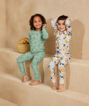 Preschooler wearing 2-piece ergoPouch Long Sleeve Pyjamas 1.0 TOG Fruit Salad