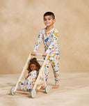 Preschooler wearing 2-piece ergoPouch Long Sleeve Pyjamas 1.0 TOG Fruit Salad