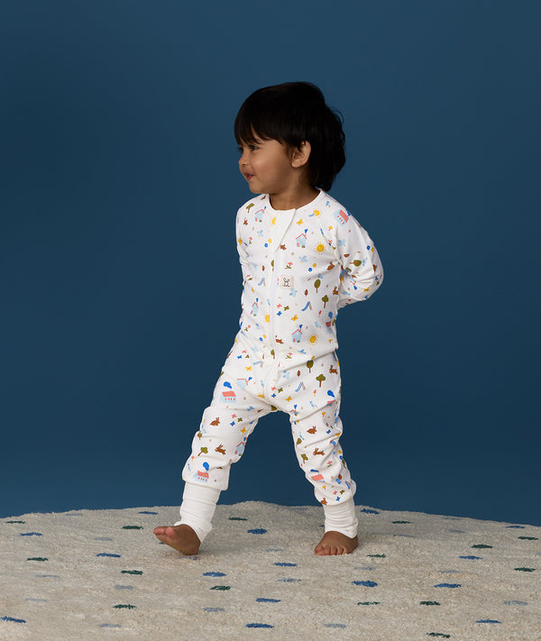 Toddler wearing ergoPouch Long Sleeve Layer 1.0 TOG Daydream