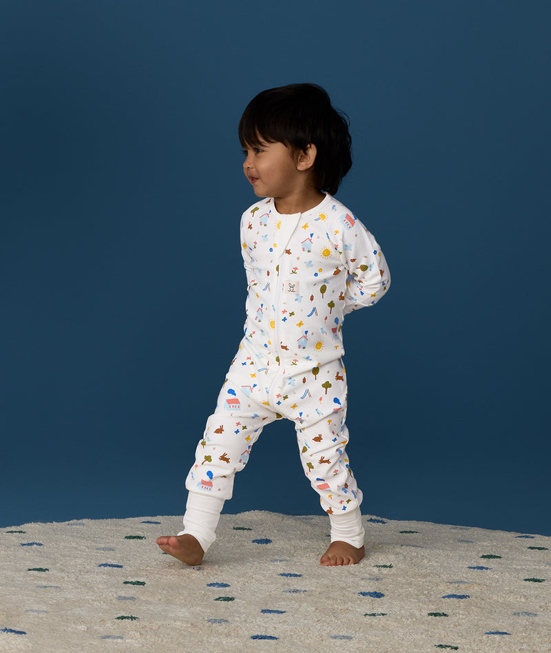 Toddler wearing ergoPouch Long Sleeve Layer 1.0 TOG Daydream