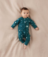 Newborn baby wearing an ergoPouch Long Sleeve Layer 0.2 TOG Ocean Blue