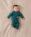 Newborn baby wearing an ergoPouch Long Sleeve Layer 0.2 TOG Ocean Blue