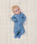 Baby lying in ergoPouch Long Sleeve Layer 1.0 TOG in Petit Pretzel