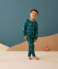 Preschooler wearing 2-piece ergoPouch Long Sleeve Pyjamas 0.2 TOG Ocean Blue for summer
