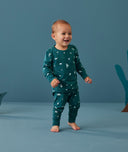Toddler wearing 2-piece ergoPouch Long Sleeve Pyjamas 0.2 TOG Ocean Blue for summer