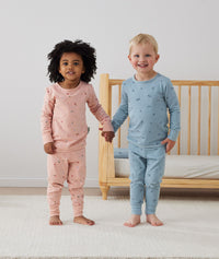 Toddler wearing 2-piece ergoPouch Long Sleeve Pyjamas 1.0 TOG Dragonflies