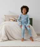 Big kid wearing 2-piece ergoPouch Long Sleeve Pyjamas 1.0 TOG Dragonflies