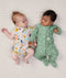 Newborn baby wearing an ergoPouch Long Sleeve Layer 1.0 TOG Sweet Orchard