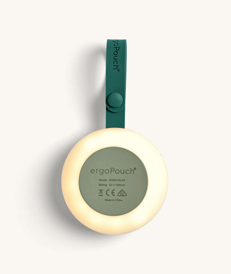 Rear view of a glowing white noise machine showing the model details and certification symbols.