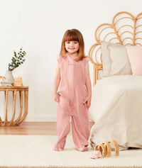 Preschooler wearing an ergoPouch Sleep Suit Bag 0.3 TOG Berries