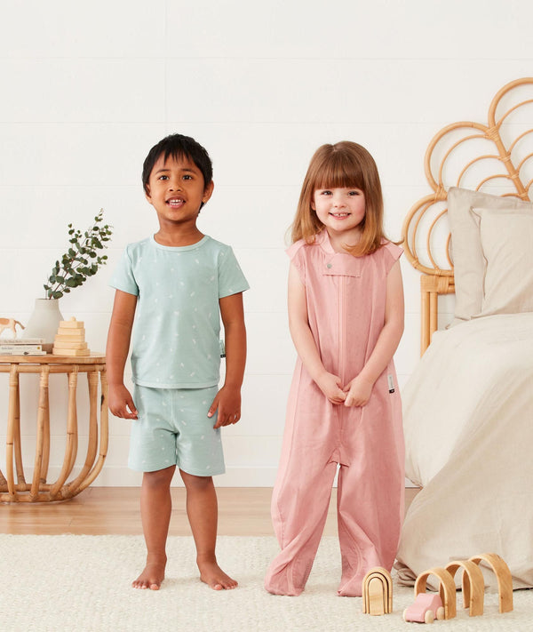 Preschooler wearing an ergoPouch Sleep Suit Bag 0.3 TOG Berries