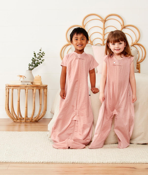 Preschooler wearing an ergoPouch Sleep Suit Bag 0.3 TOG Berries