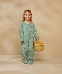 Preschooler wearing an ergoPouch Sleep Onesie 2.5 TOG Sweet Orchard