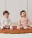 Baby wearing an ergoPouch Sleep Onesie 2.5 TOG Daisies